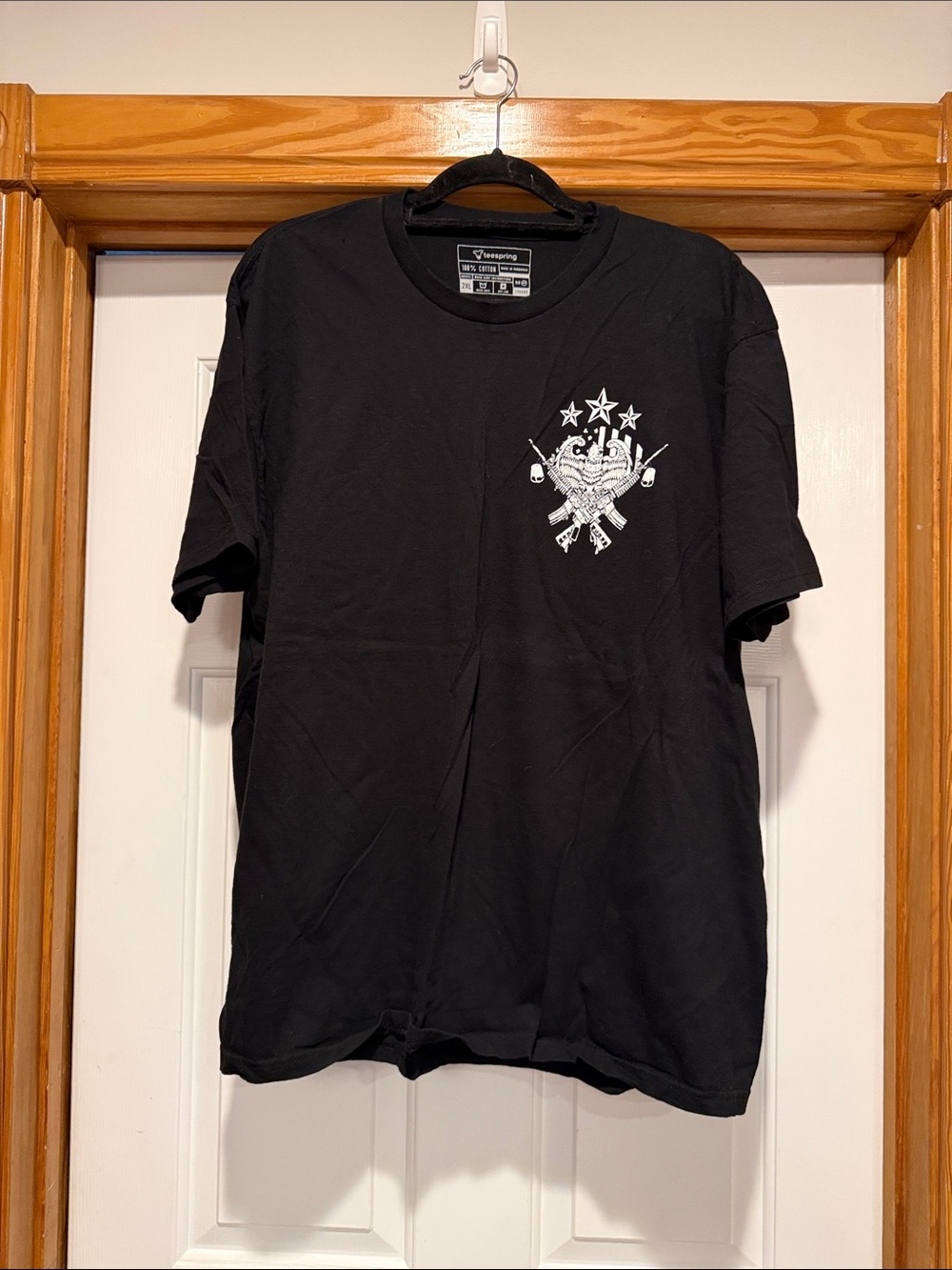 Black Crewneck Short-Sleeve Graphic Tee with Crest Detail